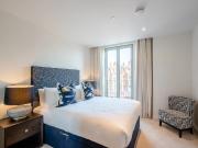 A contemporary two bedroom, second floor apartment in a...