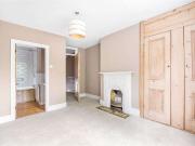 A delightful family home moments from Brandlehow school...