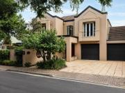 A DISTINGUISHED TWO STOREY RESIDENCE FEATURING CLASSIC...