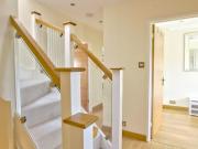 A five bedroom, two bathroom house with a west facing...