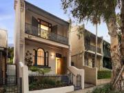 A freestanding classic in a leafy urban village pocket