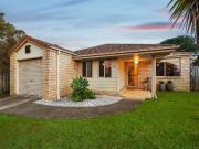 A FRESH START AWAITS IN THIS IMMACULATE EVERGREEN ESTATE...