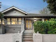 A Golden Mile Bungalow Beauty with Bay Glimpses