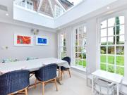 A Grade II listed country home with annexe and barn, set...