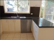 A HIDDEN HAVEN OF SINGLE LEVEL LIVING