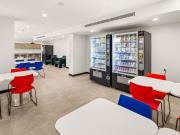 A large studio apartment equipped with a separate...