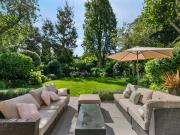 A modern ground floor period apartment with a private...