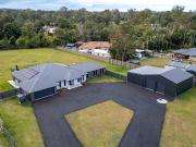 A Modern Home On An Envious Semi Rural Block With An...