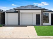 A modern residence shaped for family life and relaxed...