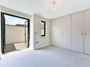 A modern three storey town house with wonderful roof...