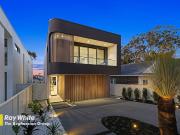 A Quality Built Home with a Modern Aesthetic A Quality Built Home with a Modern Aesthetic