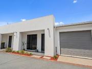 A refined townhouse where comfort, convenience and...