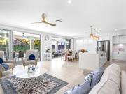 A Showstopping Resort Style Home by the Canal!