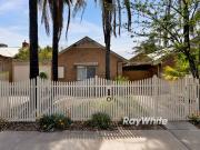 A Solid Home in the Heart of the Town