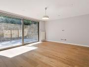 A spacious family home with private parking located in...