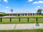 A spacious family sanctuary with pool & large shed on...