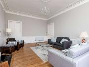 A spacious second floor four bedroom apartment, with two...