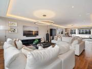 A spectacular duplex penthouse apartment located in...