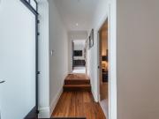 A striking three bed, three bath penthouse apartment in...