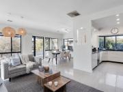 A STUNNING FAMILY HOME SET IN A TRANQUIL OASIS OFFERING...