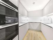 A stunning three bedroom, three bathroom located right...