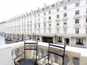 A stylish split level studio apartment with a private...