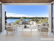 A Sunny North East Facing Waterfront Masterpiece in...
