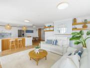 A Top Floor Coastal Residence with Exclusive Rooftop...