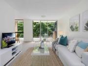 A Tranquil Hideaway In A Leafy Village Enclave