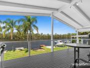 A Unique Dual Living Waterfront Home with Private Jetty