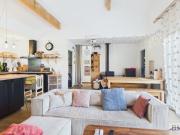A vendre maison état neuf en bois avec jardin plein sud