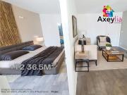 A VENDRE RENAISON IMMEUBLE AVEC GARAGE ET LOCAL COMMERCI