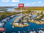 A Waterfront Masterpiece in Calypso Bay