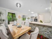 A WELCOMING FAMILY HOME ON ACREAGE!