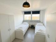 Above the Rooftops: Central City Apartment with Stunning...