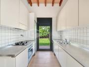 ACCOGLIENTE APPARTAMENTO CON GIARDINO VICINO ALLA TASIS