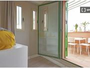 Acogedor apartamento de 1 dormitorio con terraza y aire...