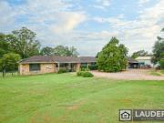 Acreage Home Close to Town