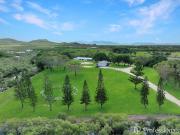 ACREAGE RETREAT IN THE HEART OF TOWN