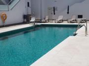 ADOSADO DE DOS DORMITORIOS, DOS BAÑOS Y PISCINA COMUNITARIA