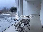 AFFITTASI NUOVO 2.5 LOCALI CON GIARDINO A BREGANZONA
