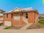 AFFORDABLE COMFORT IN QUIET COURT LOCATION