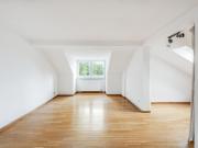 AIGNER 1,5 Zimmer Dachgeschosswohnung im Zentrum Münchens