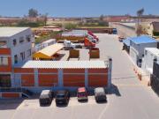 ALQUILA AMPLIO LOCAL INDUSTRIAL CON OFICINAS...