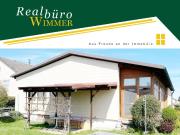 Älterer, aber gepflegter Bungalow mit großem Wintergarten