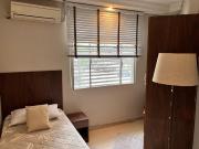 Alugo quartos no centro em apartamento novo