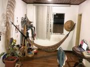 Aluguel de casa em vilarejo fechado com varanda vista à mar