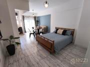 Ambiente al contrafrente con balcón Paseo Aldrey