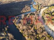 amplio lote en venta con costa del río hermoso