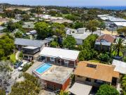 An Elevated Family Entertainer by the Coast